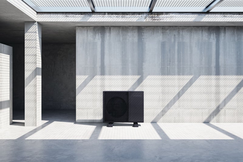2259349473 Front view on blank sunlit concrete wall background with place for your advertising poster or product campaign in spacious indoor empty industrial style hall. 3D rendering, mock up