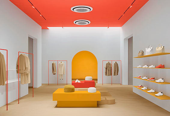 A luxury boutique store with modern interior design, creating a trendy retail space that captivates with stylish clothing.