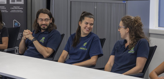 Your Energy Your Way Leah Robson and trainees sitting at a table